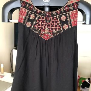 Black top with red design